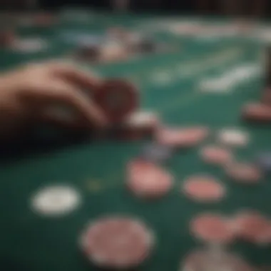 A detailed view of poker chips and cards on a table